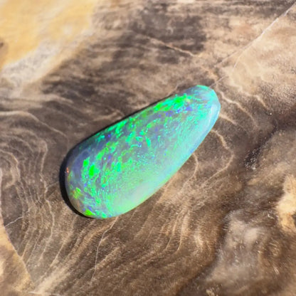 Iridescent green and blue opal.