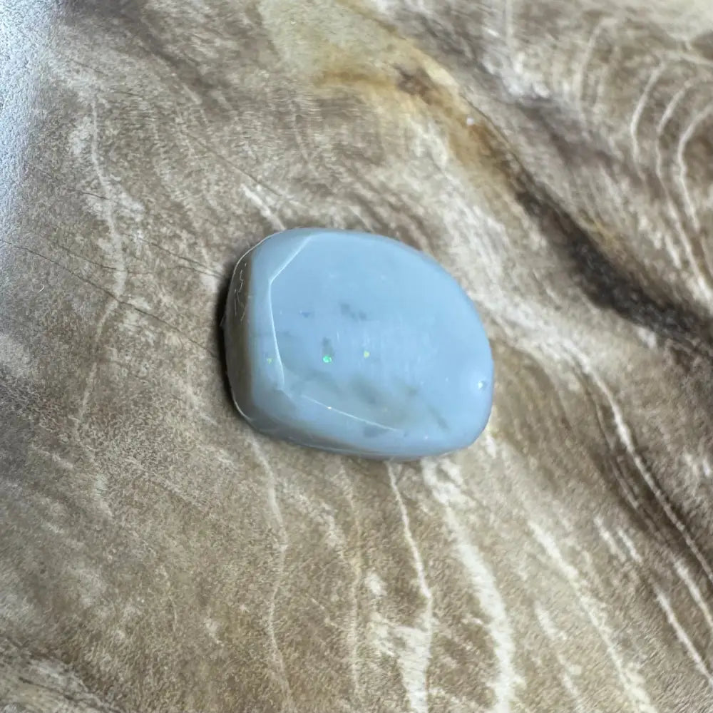 Smooth light blue opal cabochon from 3.2carat Hand-Cut Solid Lightning Ridge Semi Black Opal