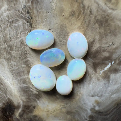 Iridescent oval opals.
