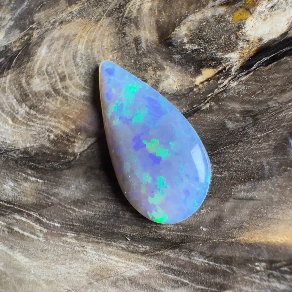 Iridescent teardrop-shaped opal.