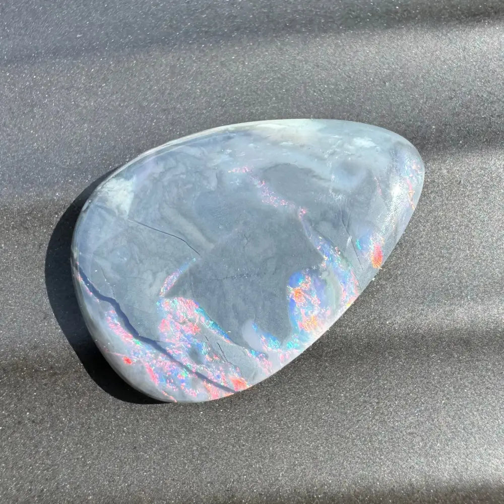 Iridescent gray opal cabochon from 5.7 carat Hand-Cut Solid Lightning Ridge Semi Black Opal