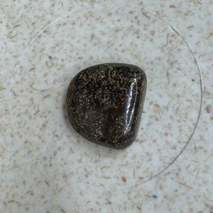 Polished dark Queensland Boulder Opal with metallic flecks for luxurious jewelry design