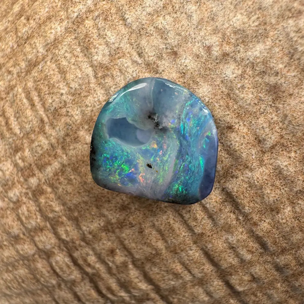 Polished 5.9ct Hand-cut Queensland Boulder Opal showcasing vibrant color play