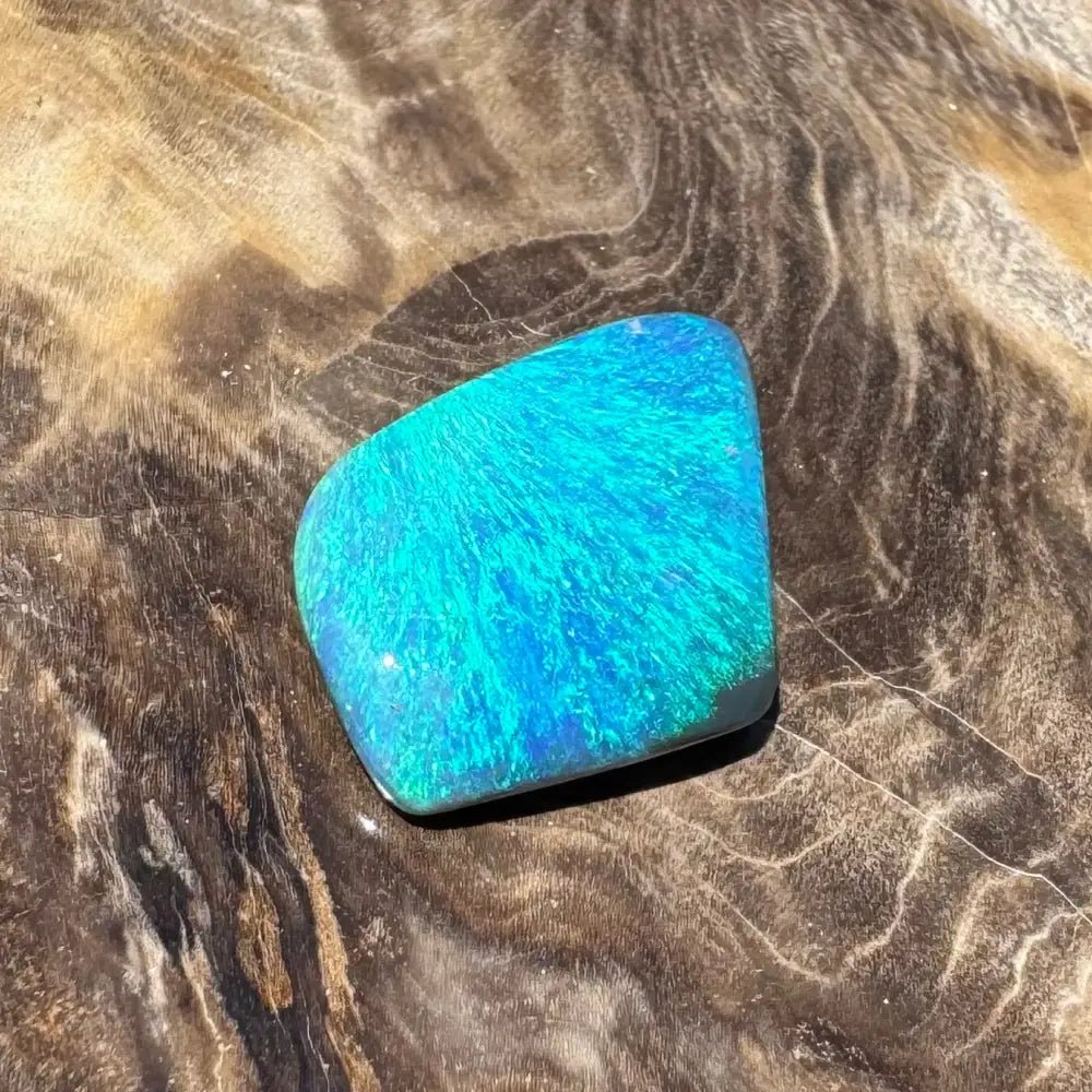 5.6ct Lightning Ridge Black Opal Solid Hand - Cut