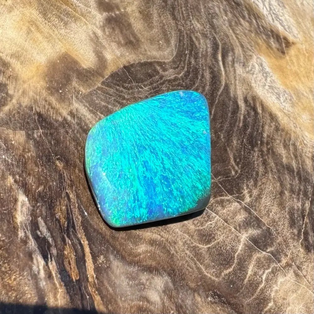 5.6ct Lightning Ridge Black Opal Solid Hand - Cut