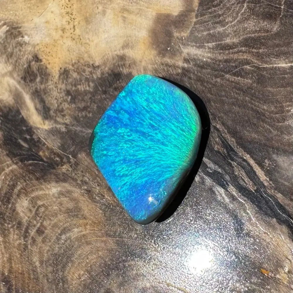 5.6ct Lightning Ridge Black Opal Solid Hand - Cut