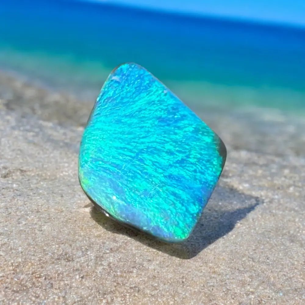 5.6ct Lightning Ridge Black Opal Solid Hand - Cut