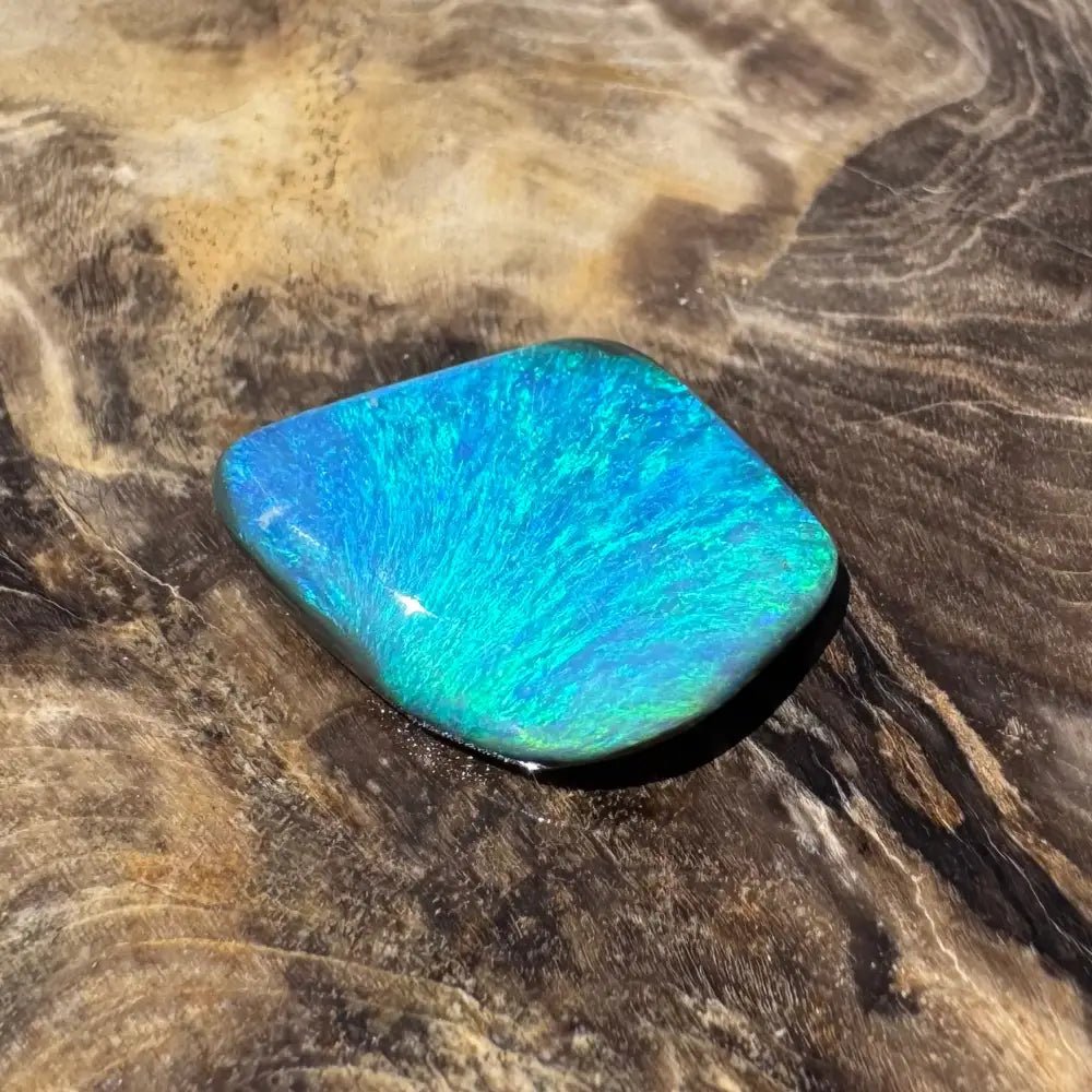 5.6ct Lightning Ridge Black Opal Solid Hand - Cut