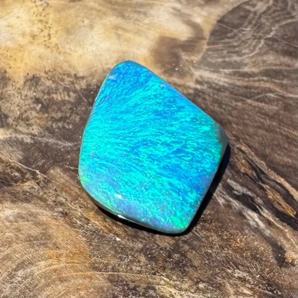 5.6ct Lightning Ridge Black Opal Solid Hand - Cut