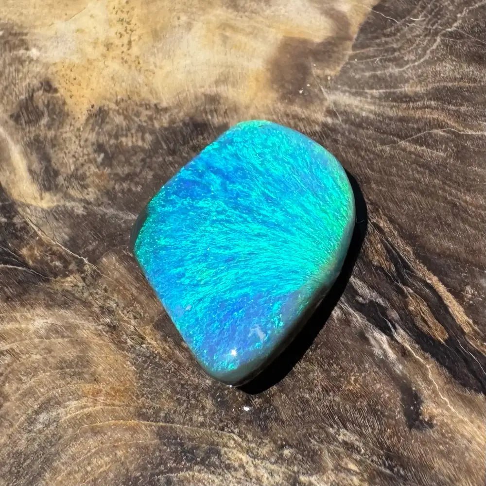 5.6ct Lightning Ridge Black Opal Solid Hand - Cut