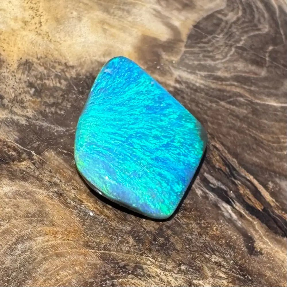 5.6ct Lightning Ridge Black Opal Solid Hand - Cut