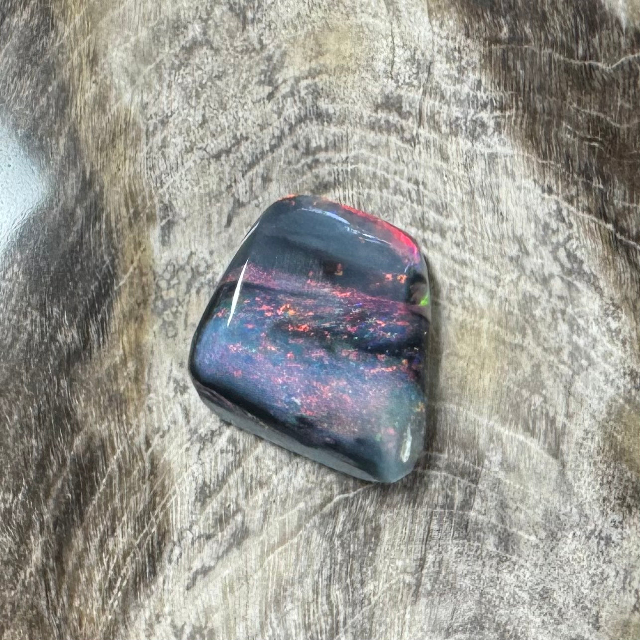 Hand-Cut Solid Lightning Ridge Black Opal 0.9carat