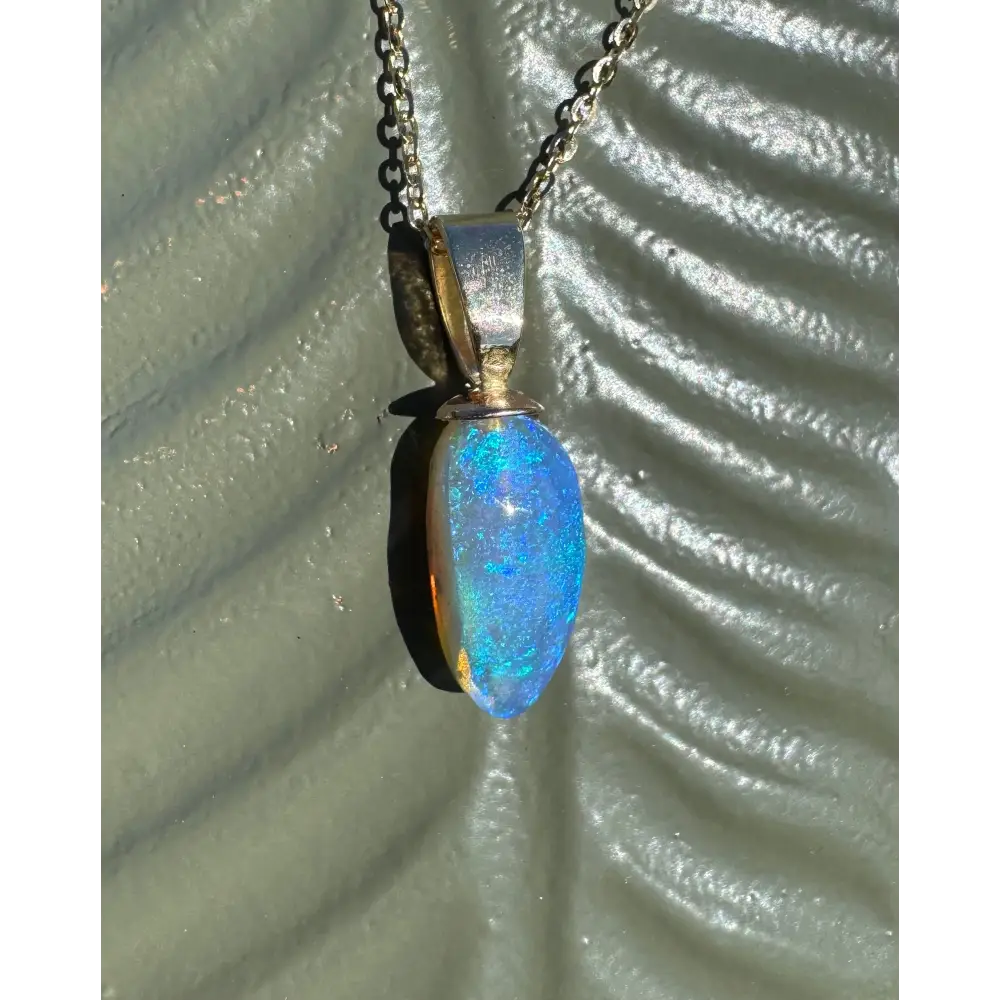 Opal pendant necklace from Airlie Waters with handcrafted 9ct solid gold and lightning ridge opal
