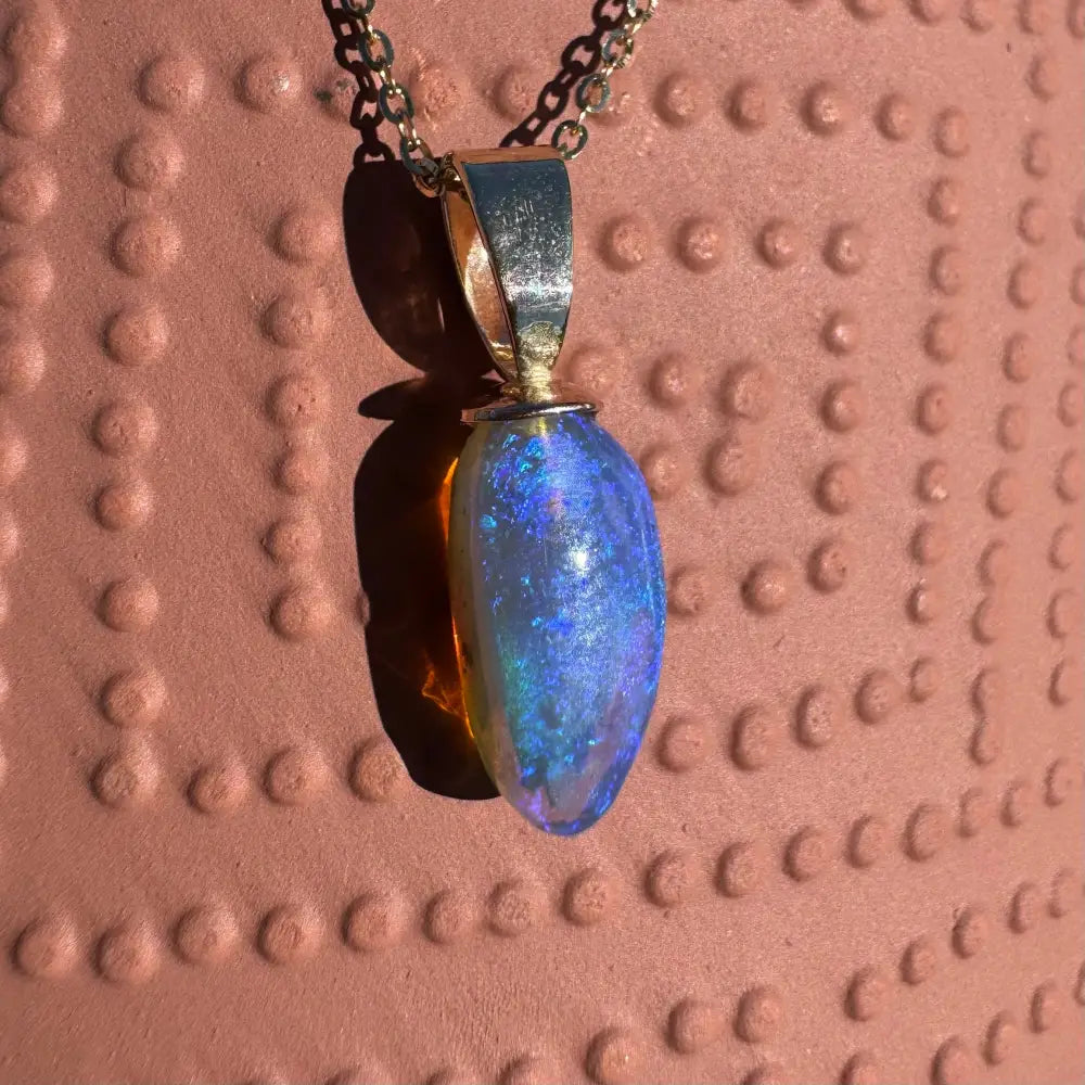Opal pendant with silver chain from Airlie Waters handcrafted 9ct solid gold collection