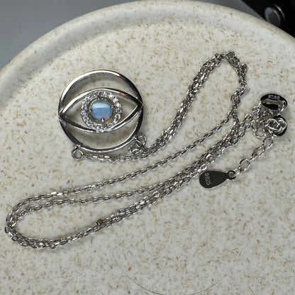 Silver eye pendant necklace featuring Blue Opal Oasis 0.3ct Lightning Ridge Opal in sterling silver