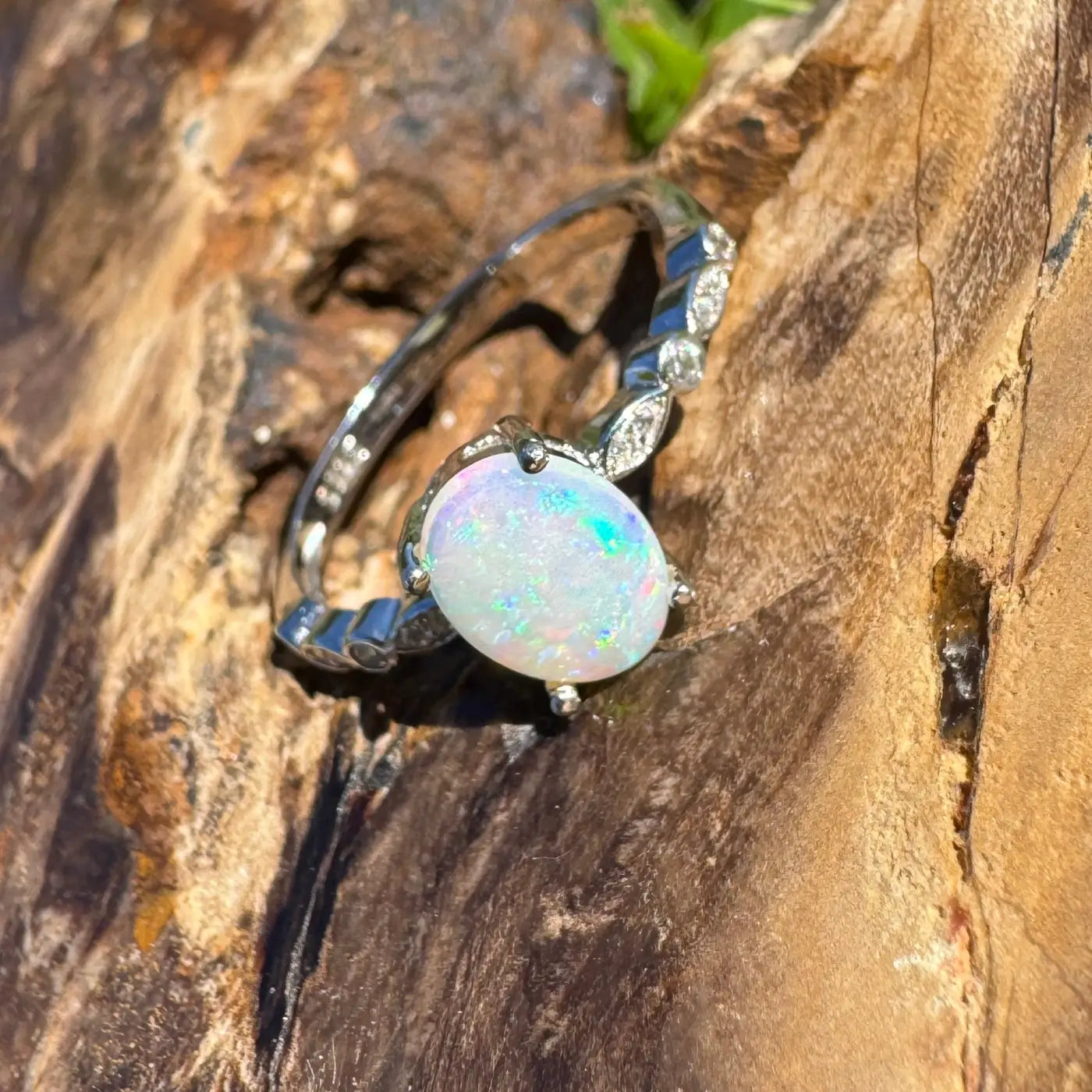 Silver ring with iridescent Coober Pedy Crystal Opal in handcrafted 925 sterling silver