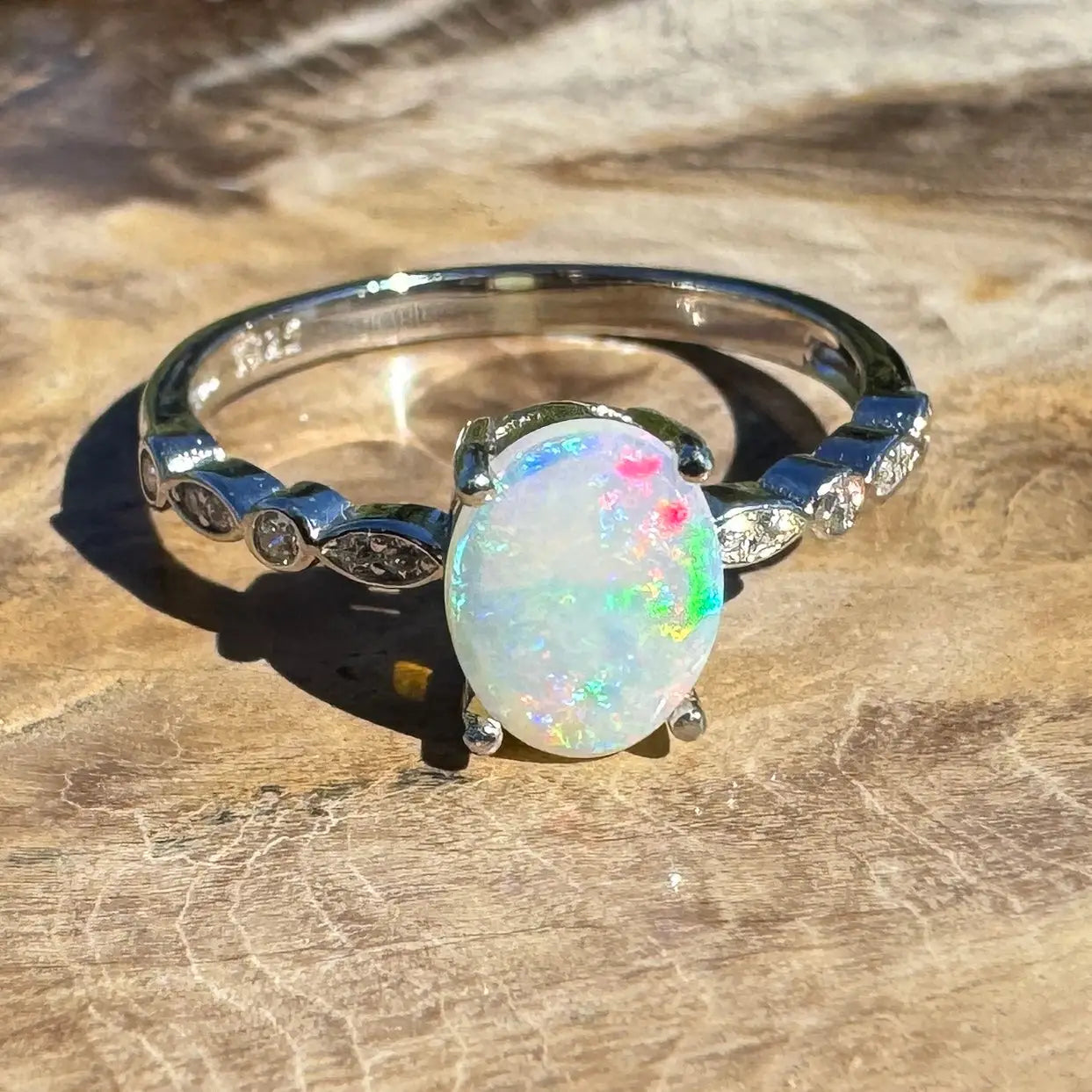 Silver ring with oval Blue Mountains Haze Coober Pedy crystal opal gemstone