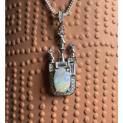 Castle-shaped opal pendant with Lightning Ridge opal and cubic zirconia in sterling silver