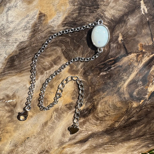 Silver chain bracelet with oval Coober Pedy opal in handcrafted Celestial Reef jewelry piece