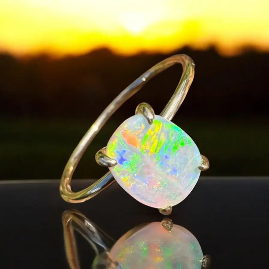 Opal gemstone ring featuring a 1ct Lightning Ridge Opal in 9ct yellow gold