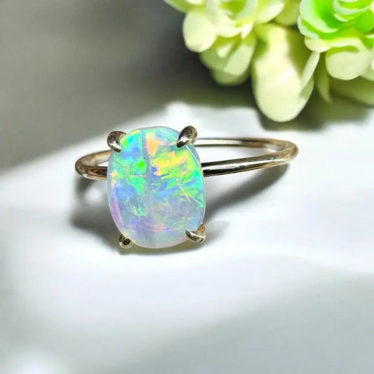 Opal gemstone ring from Colours of Australia featuring 1ct Lightning Ridge Opal in yellow gold