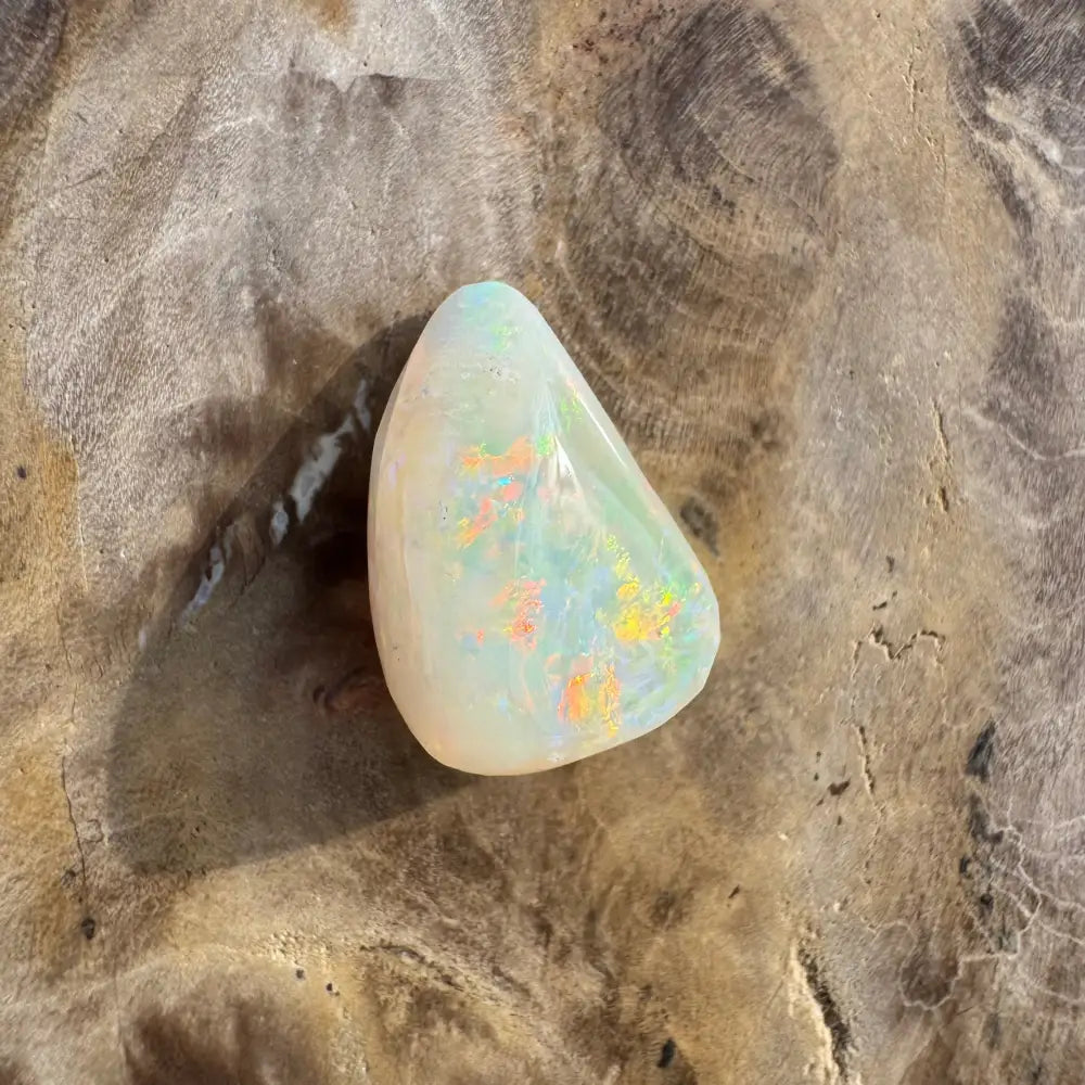 Polished Coober Pedy Opal 3.3carat solid hand-cut gemstone with iridescent colors