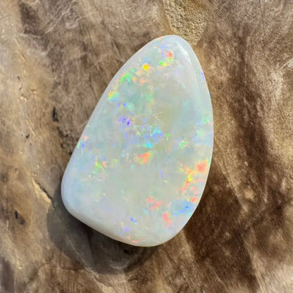 Iridescent white opal gemstone from Coober Pedy 8.4 carat solid hand-cut product