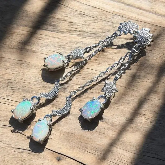 Silver opal drop earrings featuring handcrafted Coober Pedy and Lightning Ridge opals