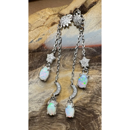 Silver opal dangle earrings from Coober Ridge Echoes featuring Coober Pedy and Lightning Ridge Opals