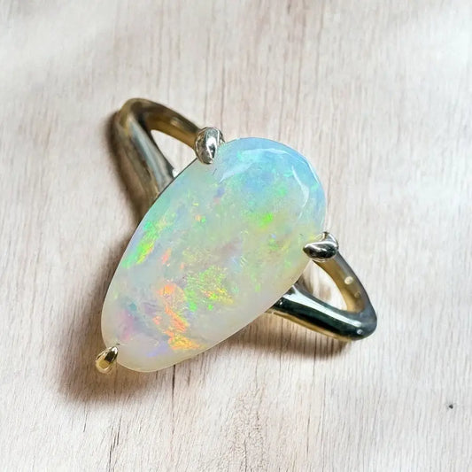Iridescent opal gemstone ring in 9ct yellow gold from Coober’s Calling collection