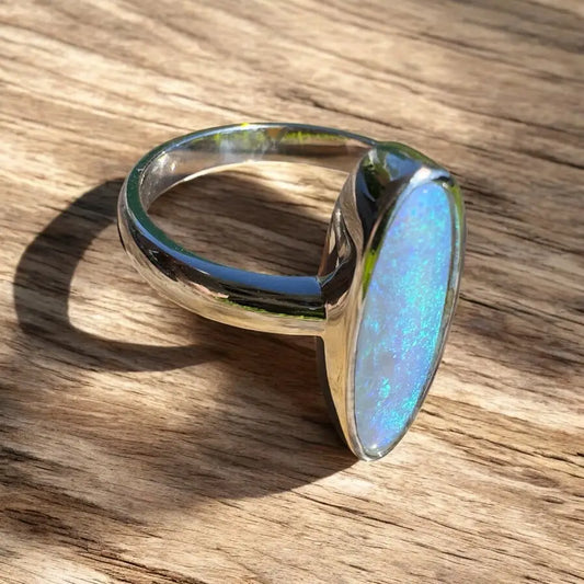 Silver ring with iridescent Lightning Ridge Crystal Opal, handcrafted in sterling silver