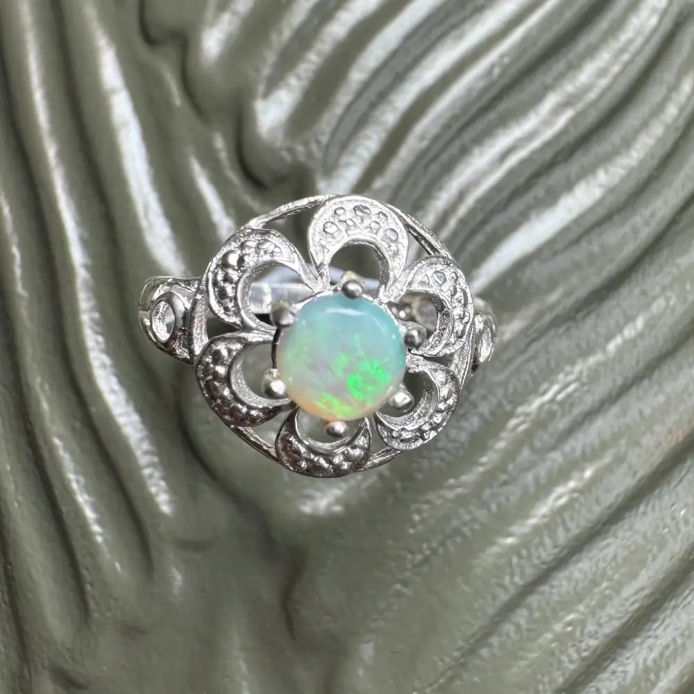 Silver ring with a 0.7ct Lightning Ridge Opal gemstone from Daintree Jewel