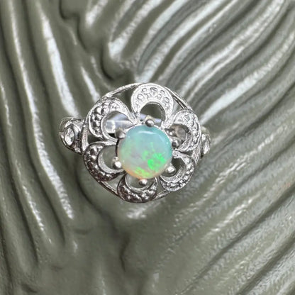 Silver ring with a 0.7ct Lightning Ridge Opal gemstone from Daintree Jewel
