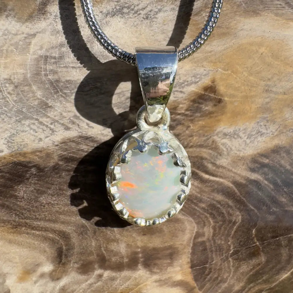Silver opal pendant necklace.