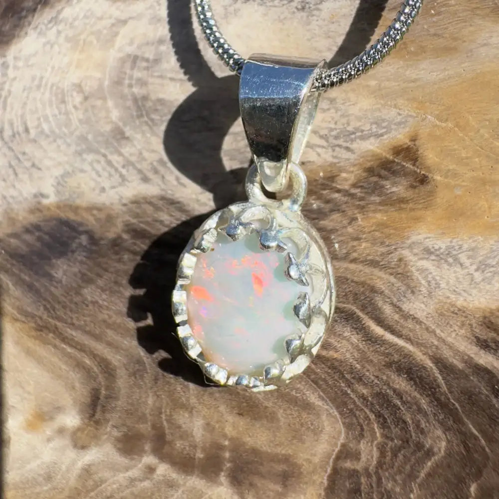 Silver opal pendant necklace.