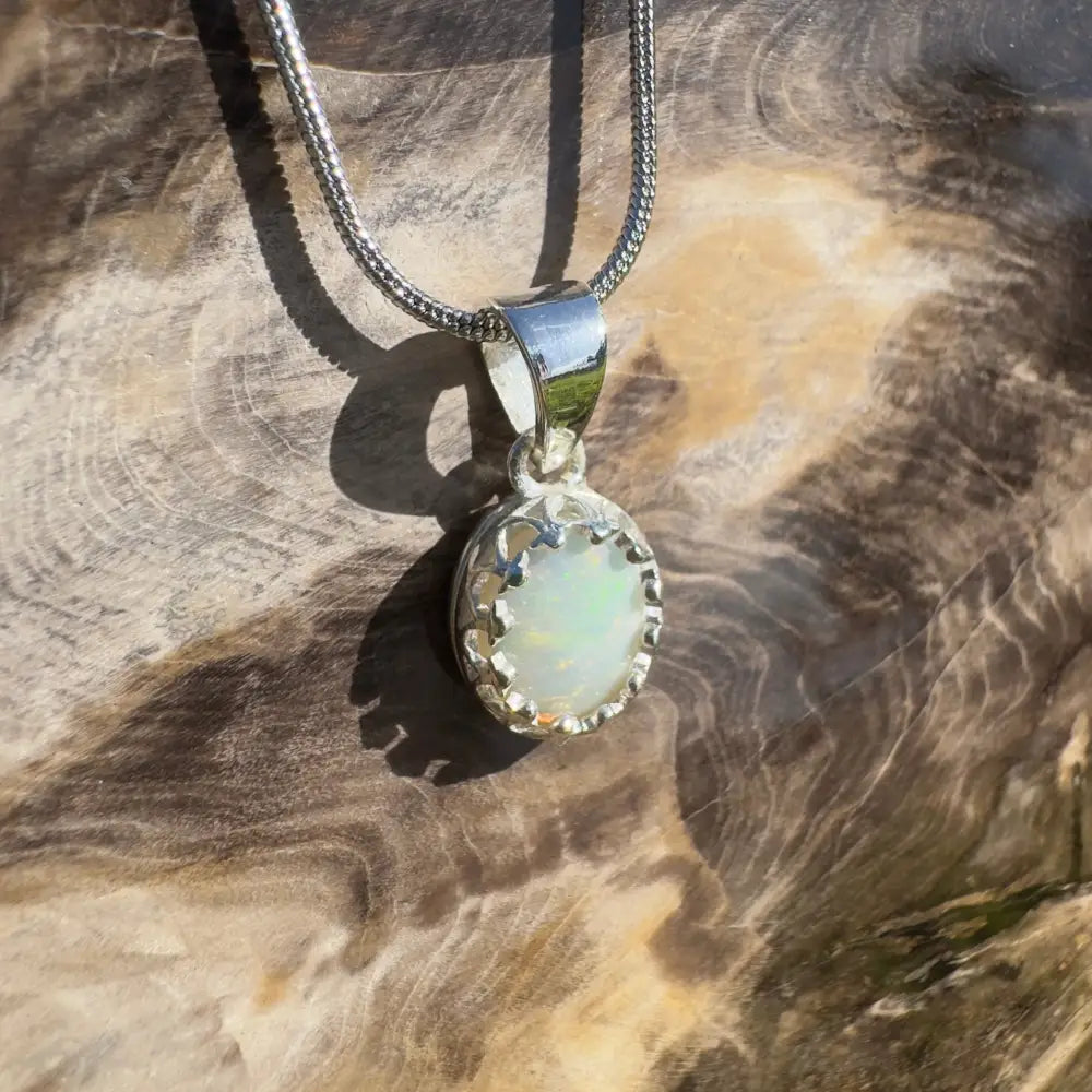 Silver opal pendant necklace.