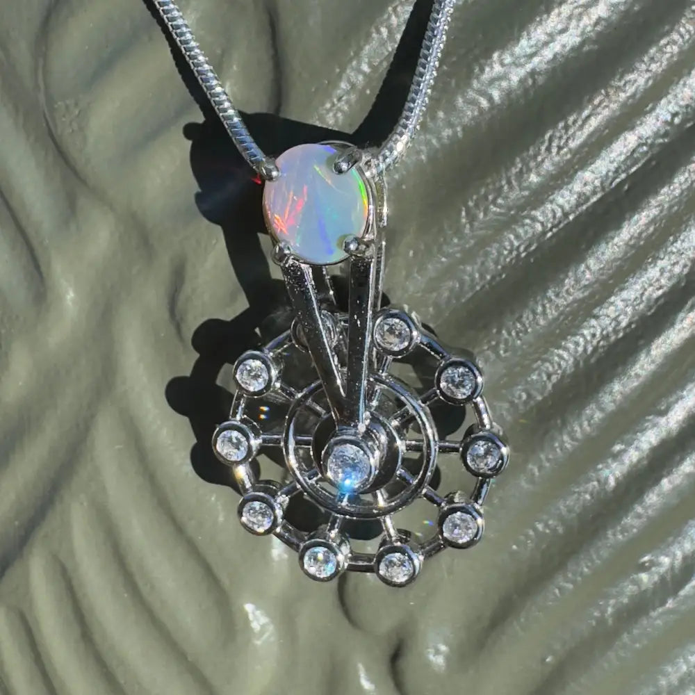 Silver pendant with opal and diamond accents from Fair Fun handcrafted Lightning Ridge Opal collection