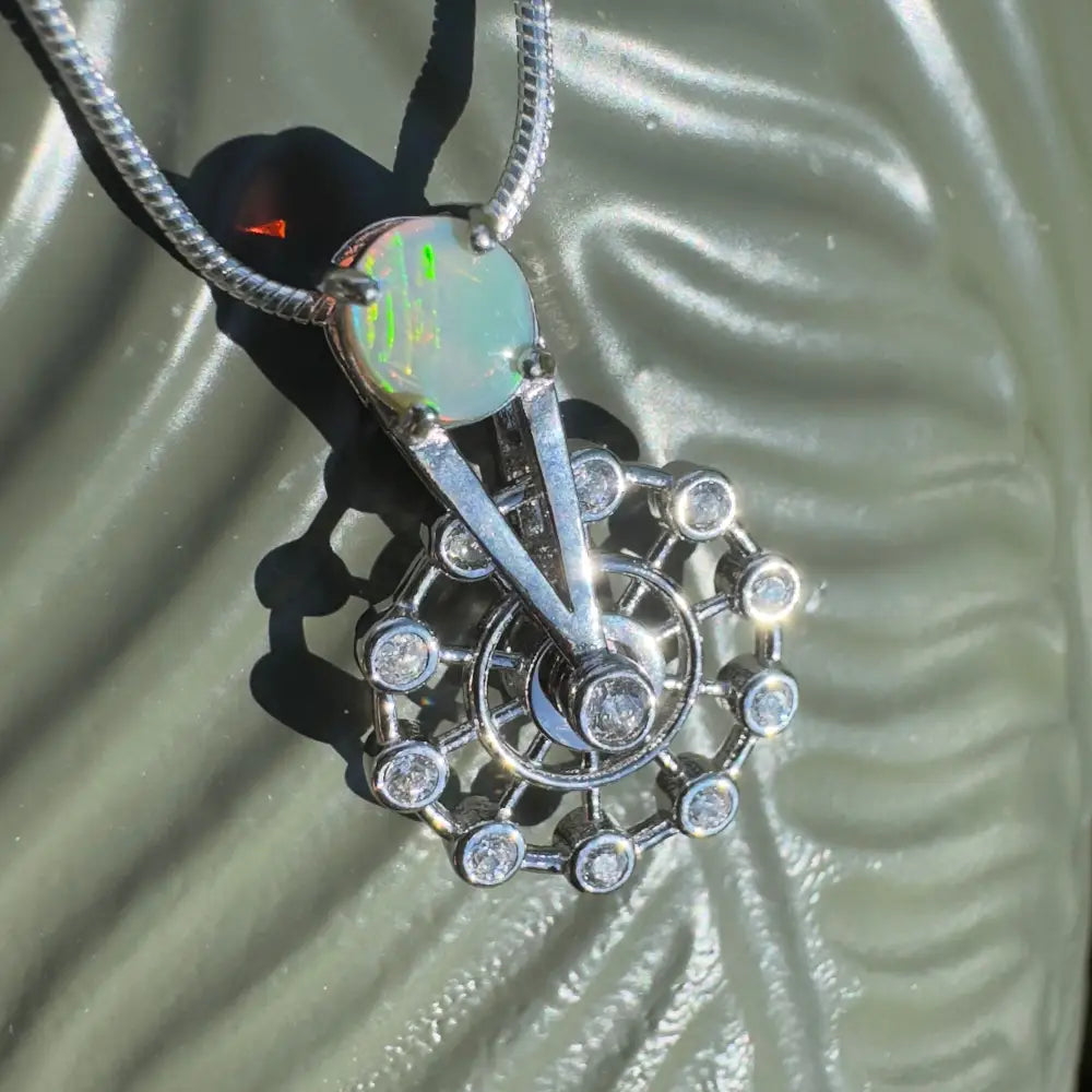Opal and diamond pendant necklace featuring handcrafted Lightning Ridge Opal and cubic zirconia in sterling silver