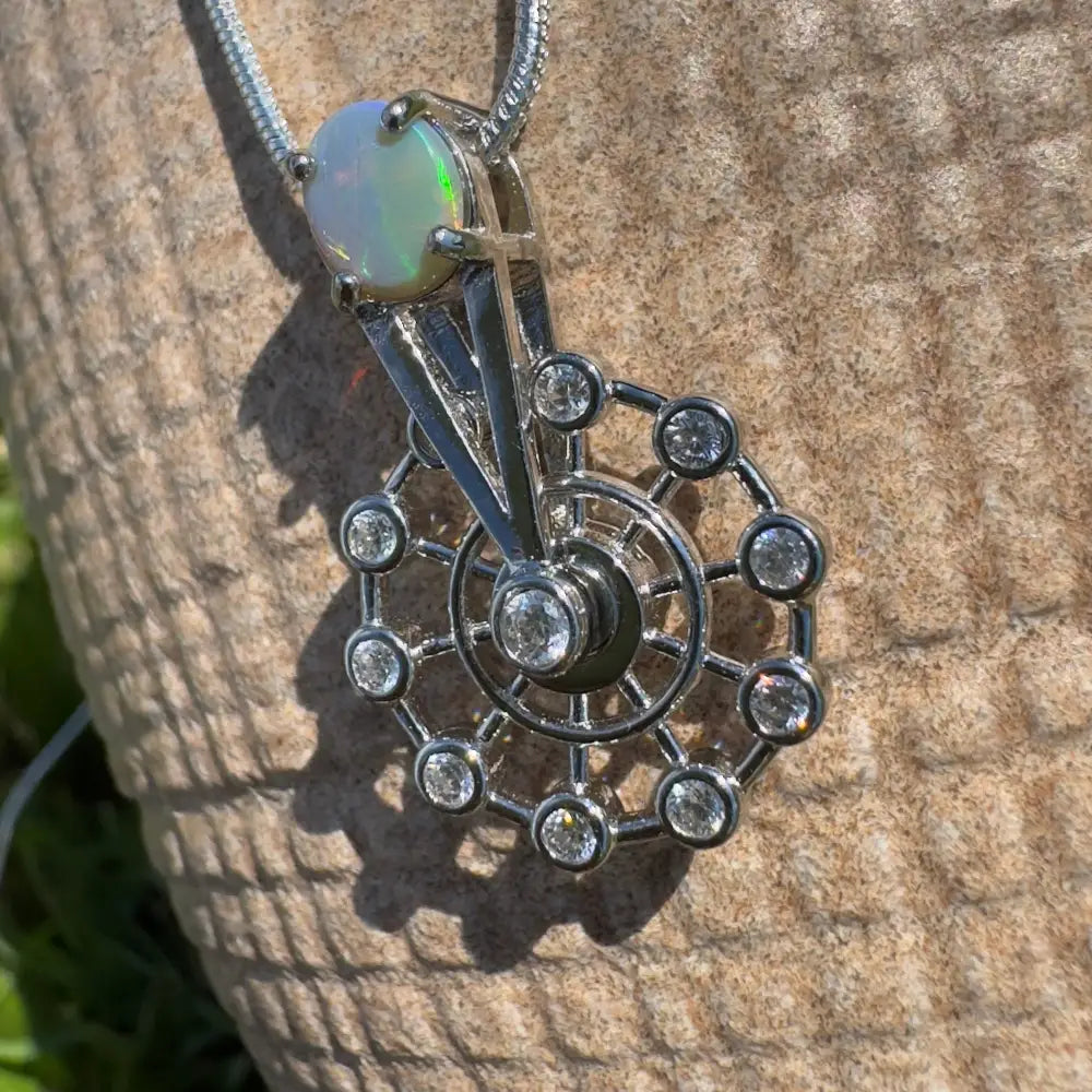 Opal and diamond spiral pendant from Fair Fun handcrafted sterling silver jewelry