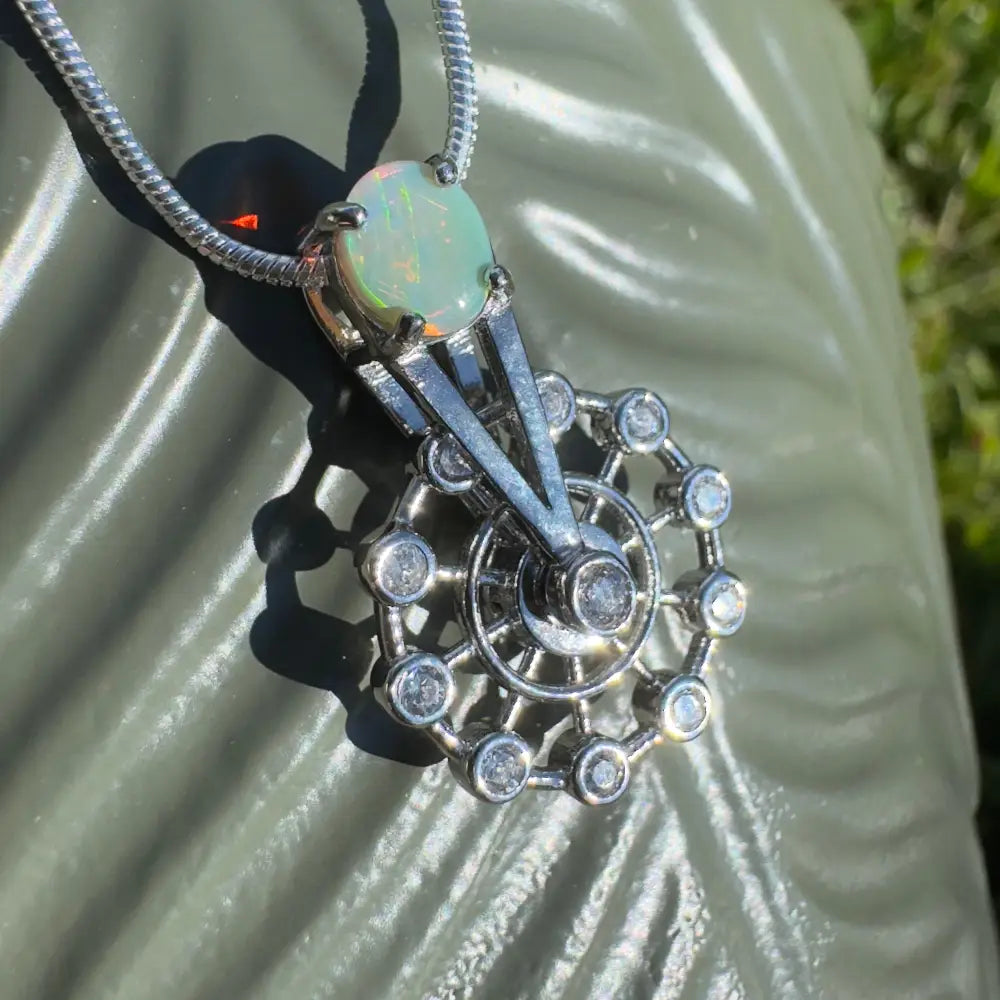 Opal and diamond pendant necklace from Fair Fun handcrafted sterling silver spinning ferris wheel