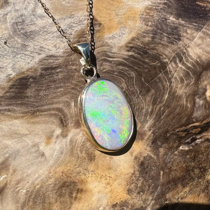 Oval opal pendant necklace in handcrafted 9ct Australian gold from Golden Dreamtime collection