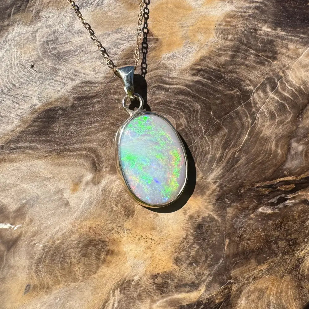 Oval opal pendant necklace from Golden Dreamtime featuring a handcrafted Lightning Ridge semi black opal