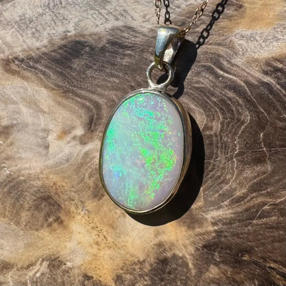 Oval opal pendant with silver setting from Golden Dreamtime handcrafted Australian gold jewelry