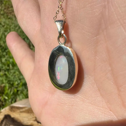 Oval opal pendant necklace from Golden Dreamtime featuring a 4.7ct Lightning Ridge opal in 9ct Australian gold
