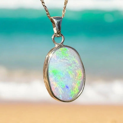 Golden Dreamtime handcrafted Opal pendant necklace featuring a 4.7ct Lightning Ridge semi black opal in 9ct Australian gold