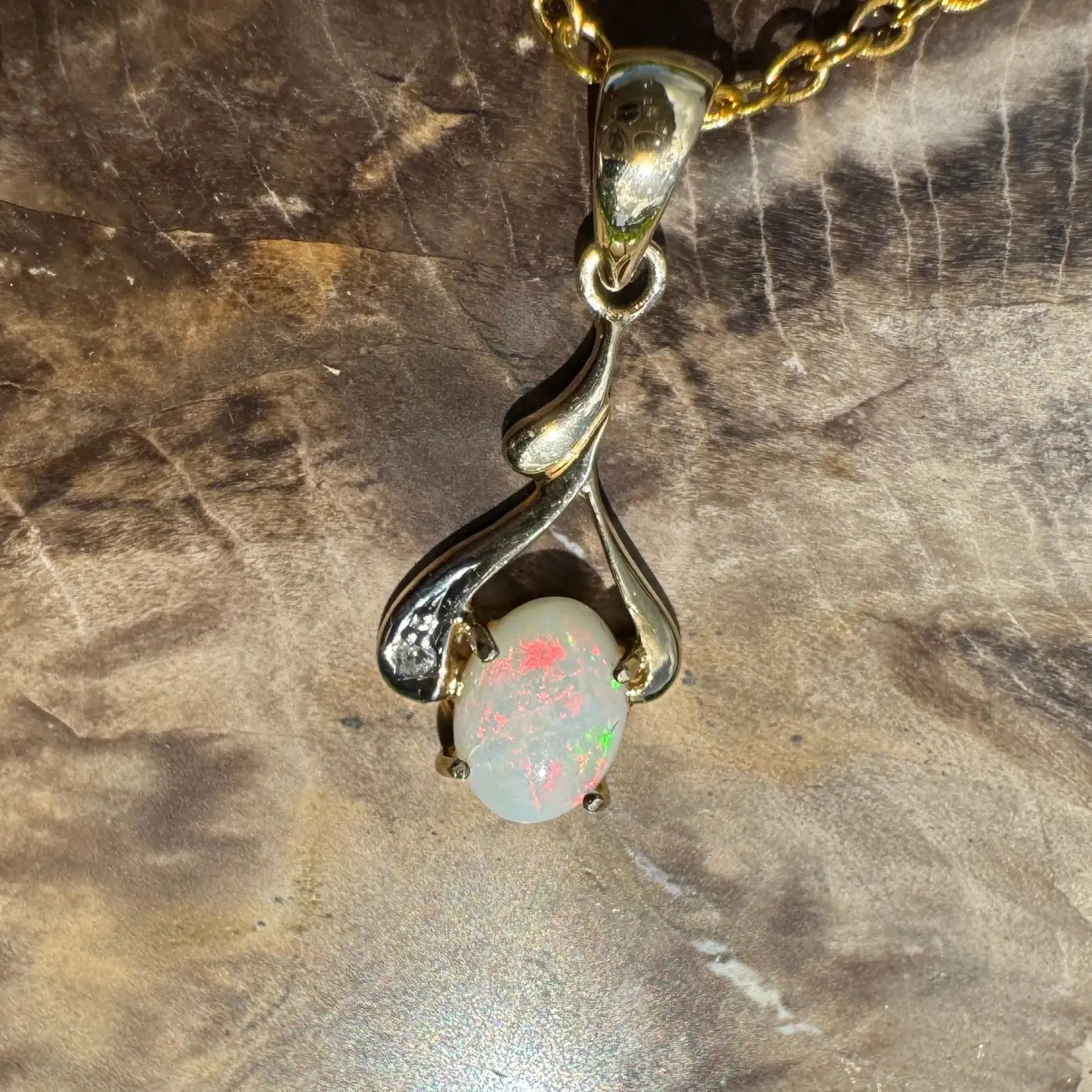 Golden Red Centre handcrafted 0.7ct Coober Pedy opal and natural diamond pendant