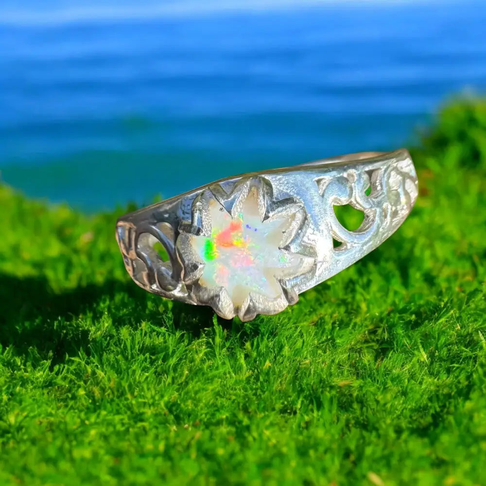 Silver ring featuring a 0.9ct Coober Pedy opal gemstone in handcrafted Sterling silver