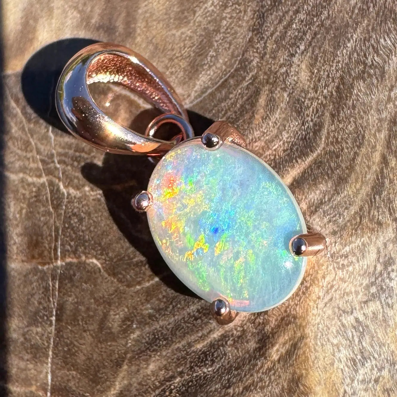 Oval opal pendant with rose gold setting from Great Ocean Drift handcrafted jewelry collection