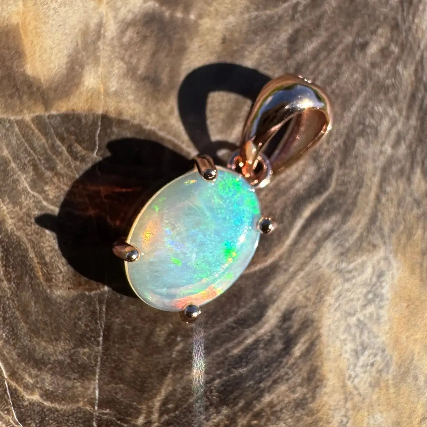 Oval opal pendant with Rose Gold setting from Great Ocean Drift in sterling silver
