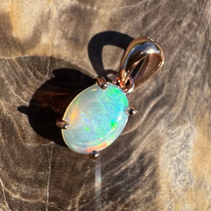 Oval opal pendant with Rose Gold setting from Great Ocean Drift in sterling silver